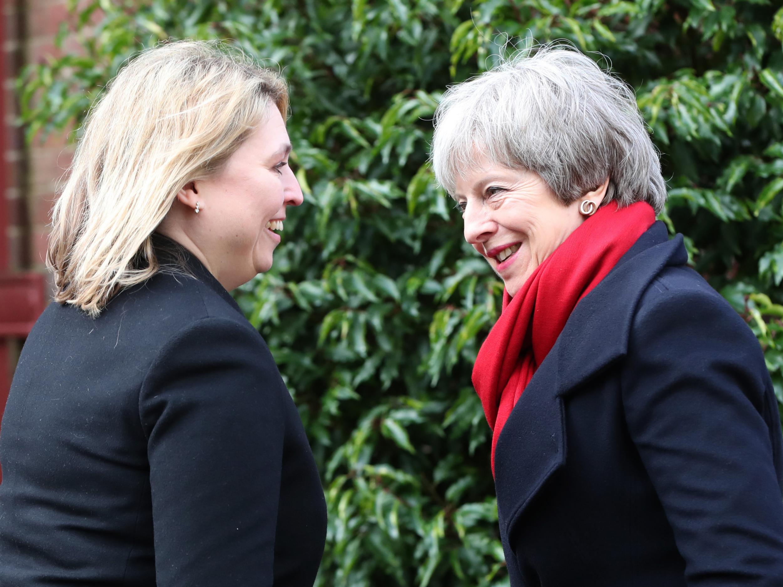 Northern Ireland Secretary Karen Bradley greets Theresa May at Stormont