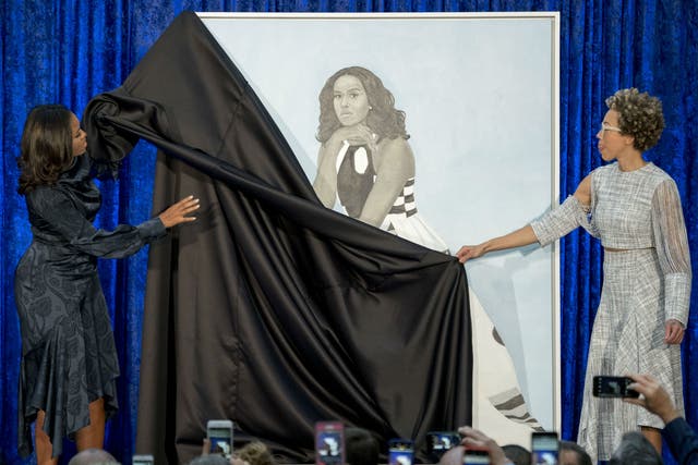 Former First Lady Michelle Obama and artist Amy Sherald unveil the official portrait