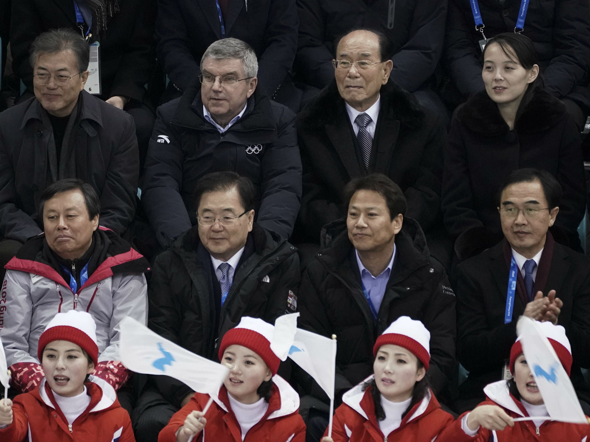 Kim Yo-jong, sister of North Korean leader Kim Jong-un, and other North Korea officials sit with Thomas Bach of the International Olympic Committee and South Korean President Moon Jae-in to watch a women's hockey game between featuring the combined Korean team