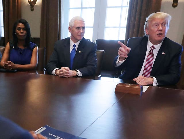 Donald Trump with Mike Pence and Omarosa Manigault Newman at the White House in March 2017