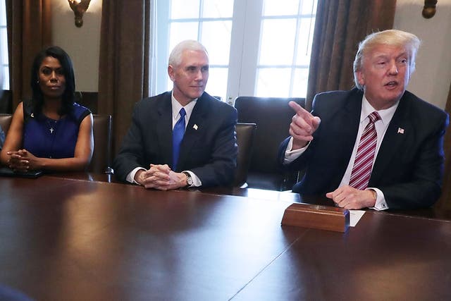 Donald Trump with Mike Pence and Omarosa Manigault Newman at the White House in March 2017