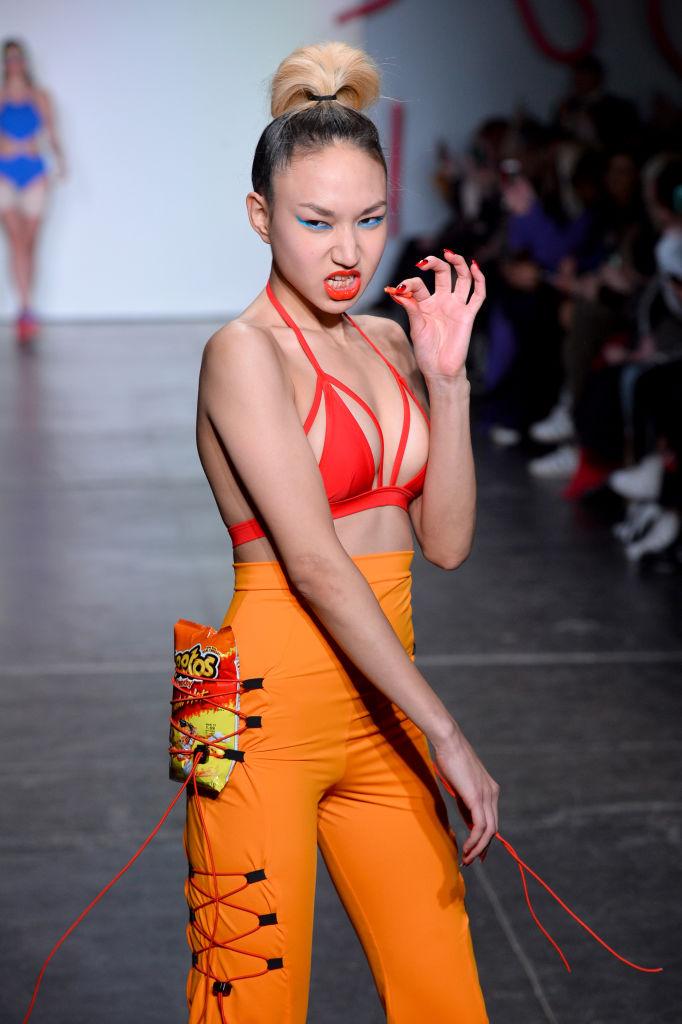 Models unashamedly indulged in junk food as they walked the runway