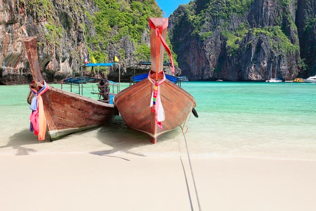 Long tail wooden boats at Maya Bay, Thailand