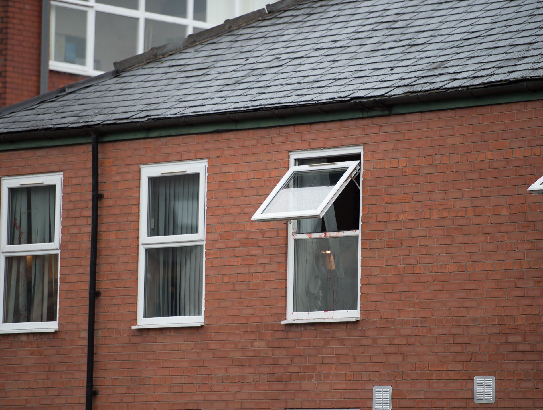 Police said they responded to reports of a man jumping out of a second floor window