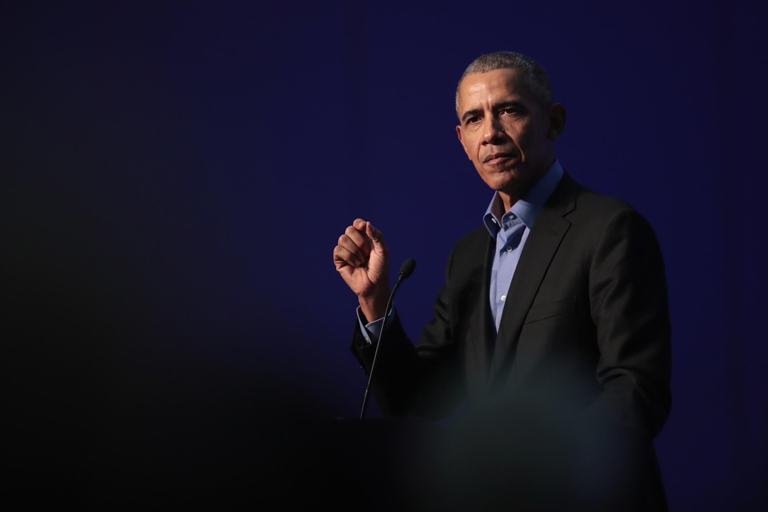 Former president Barack Obama speaks to a gathering of more than 50 mayors and other guests during the North American Climate Summit