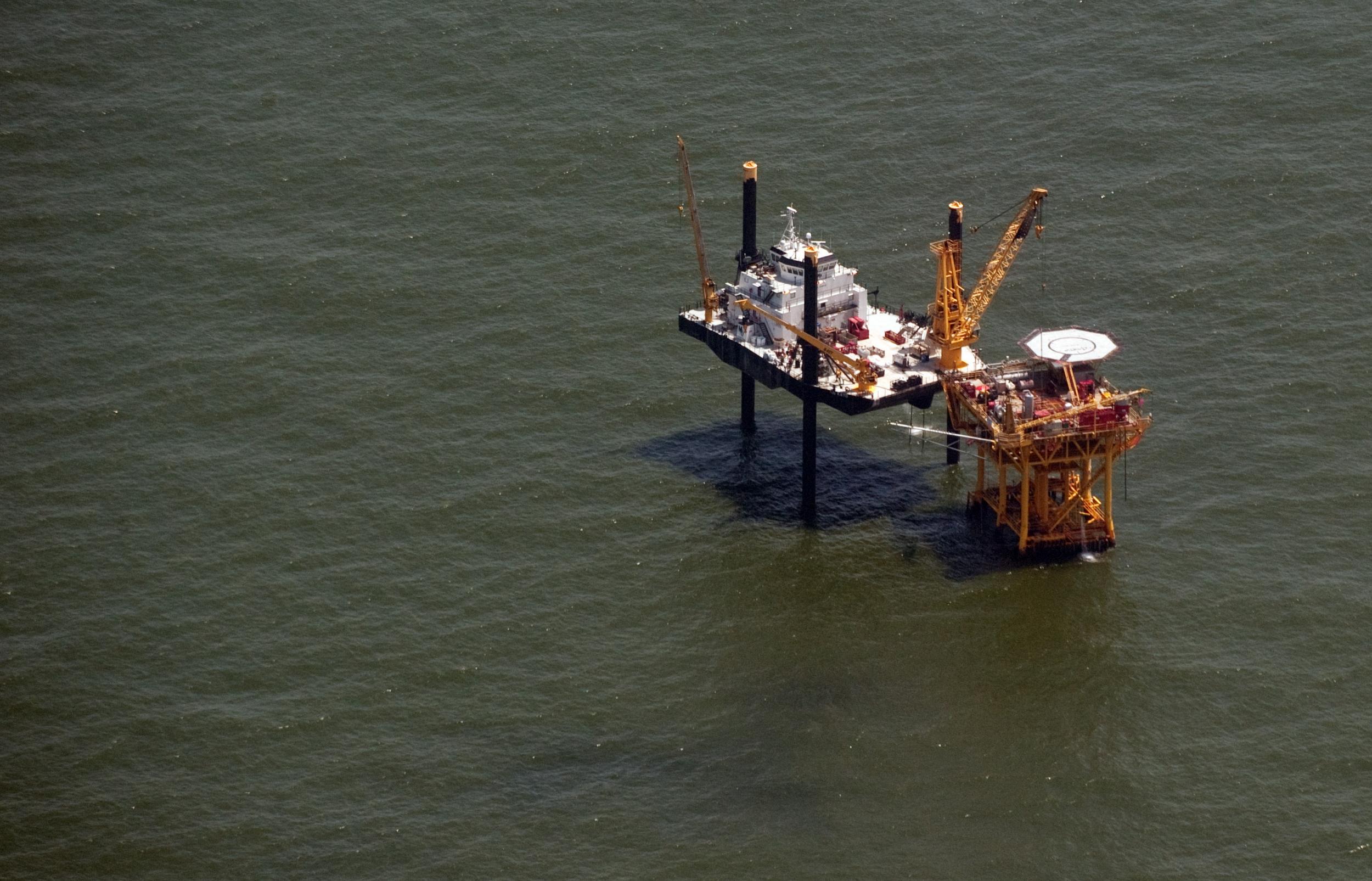 An offshore drilling rig sits in the Gulf of Mexico