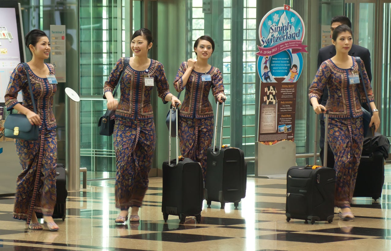 Sarong kebaya-inspired uniforms dress Singapore Airlines cabin crew
