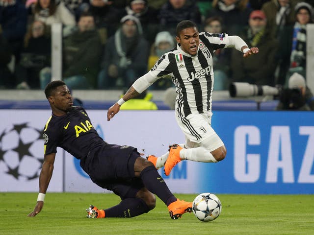 Serge Aurier gave away a penalty by fouling Douglas Costa in Tottenham's draw with Juventus