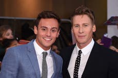 Tom Daley and Dustin Lance Black release first photos of baby boy