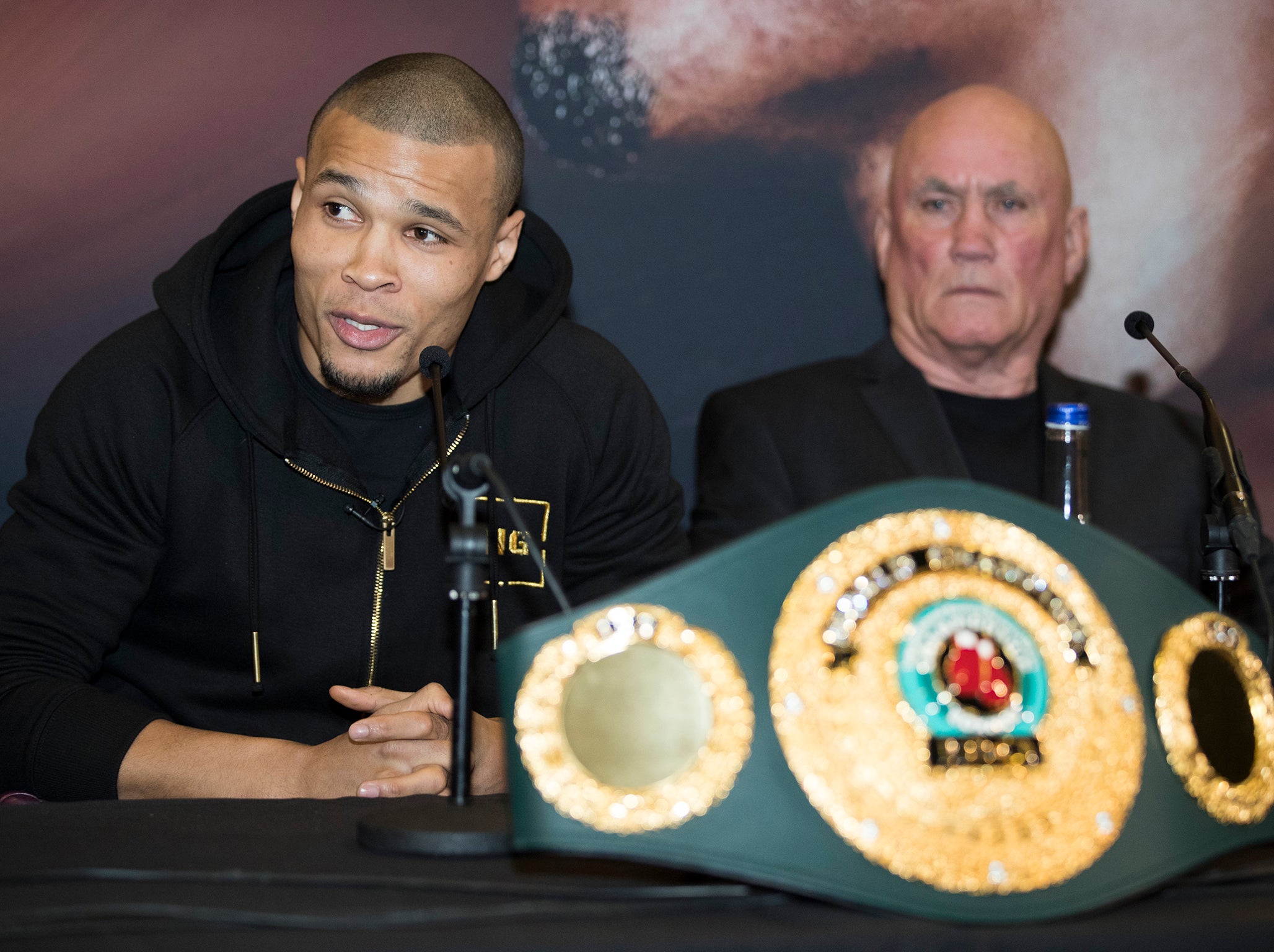 Eubank Jr sat next to his long-time trainer, Ronnie Davies