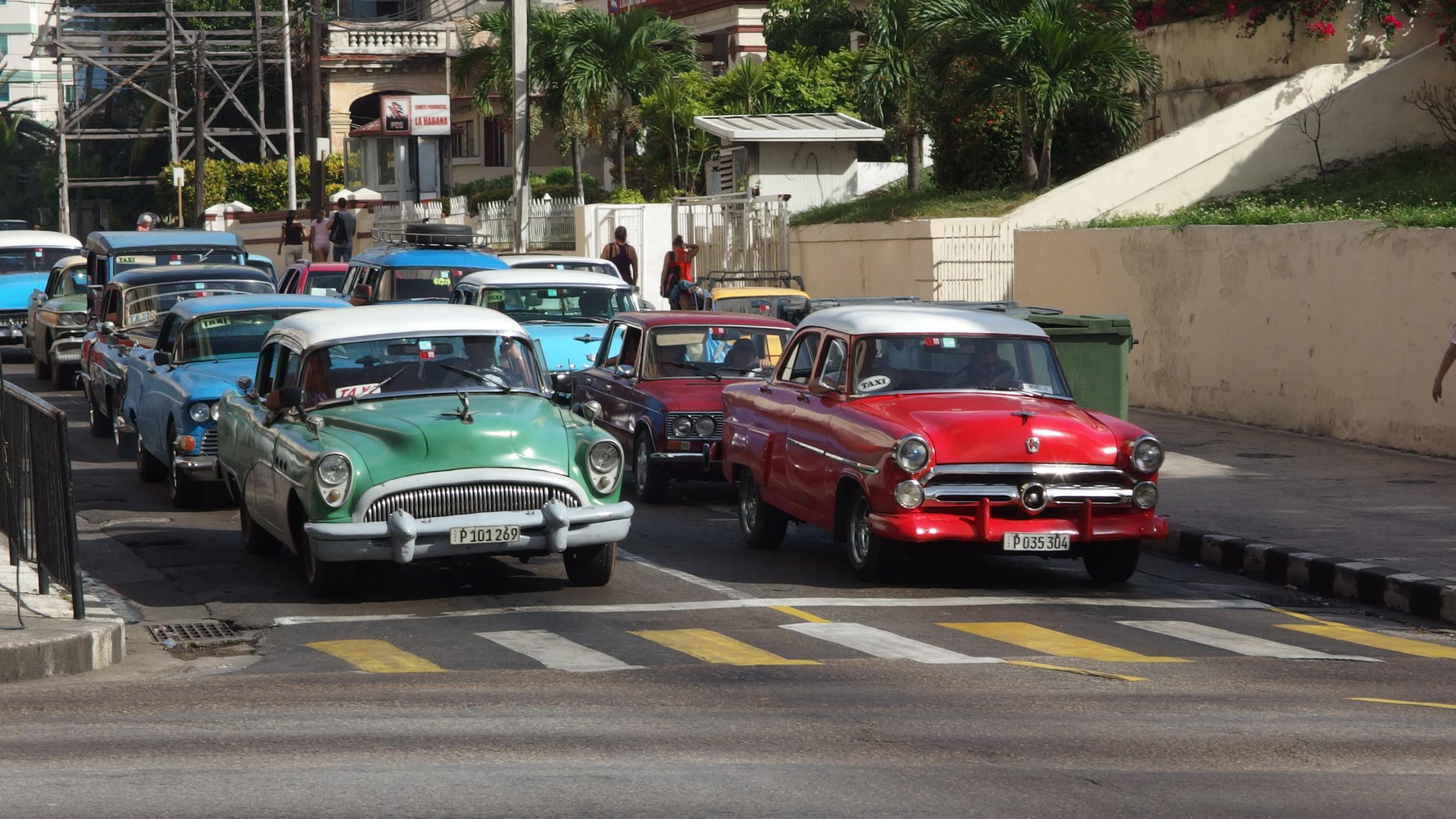 Cuban congestion: cars waiting for traffic lights to change on La Rampa in Havana