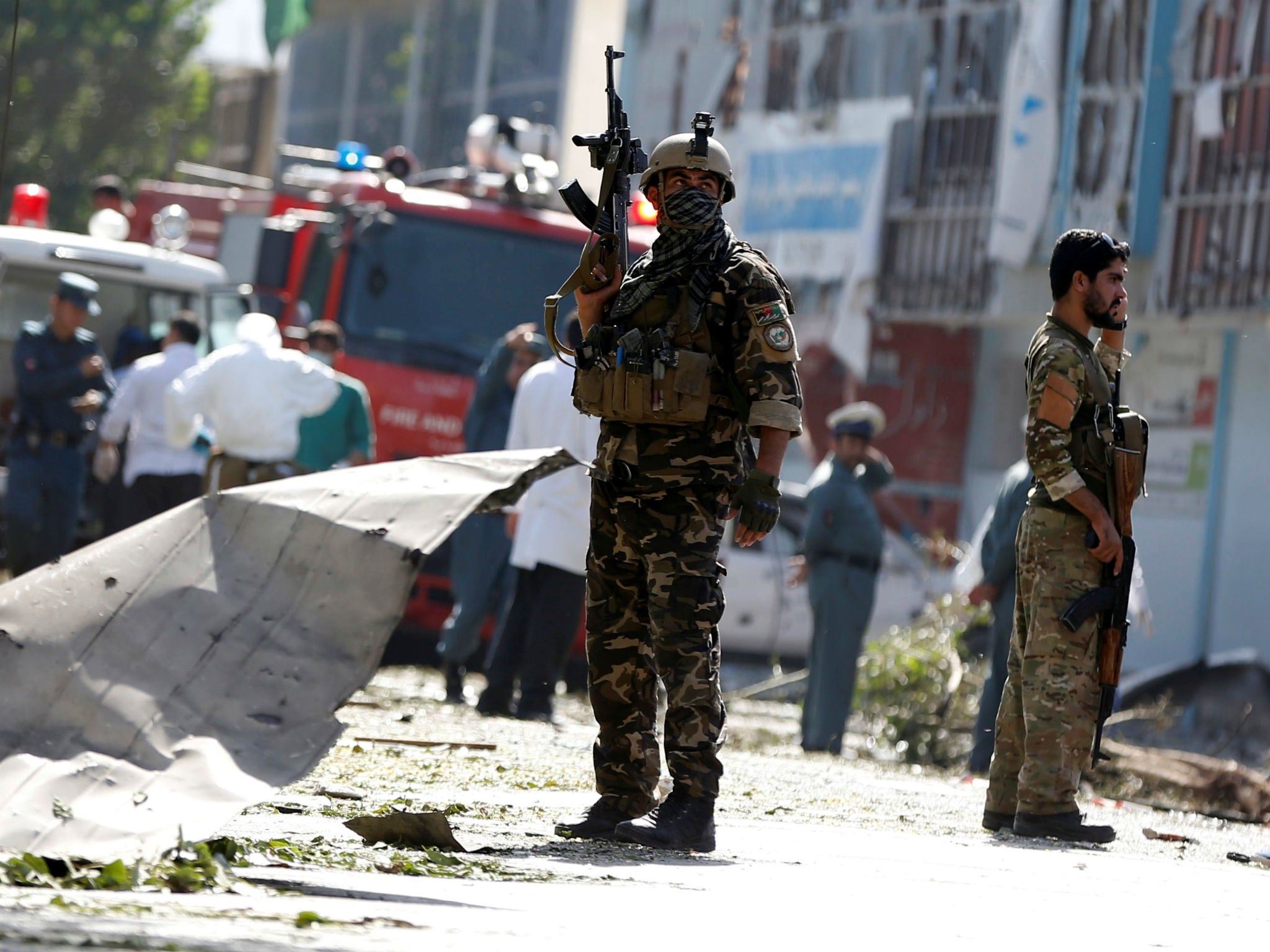 Afghan security forces at the site of a suicide attack in Kabul