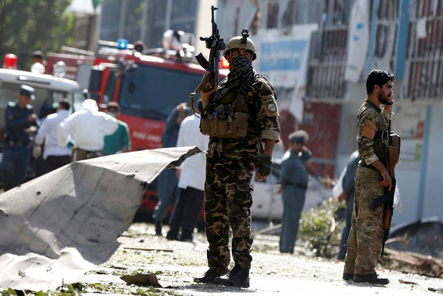 Afghan security forces at the site of a previous suicide attack in Kabul