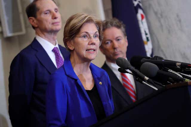 Elizabeth Warren speaks during a news conference in the Russell Senate Office Building on Capitol Hill