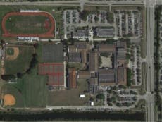 Suspect still at large in Florida high school shooting