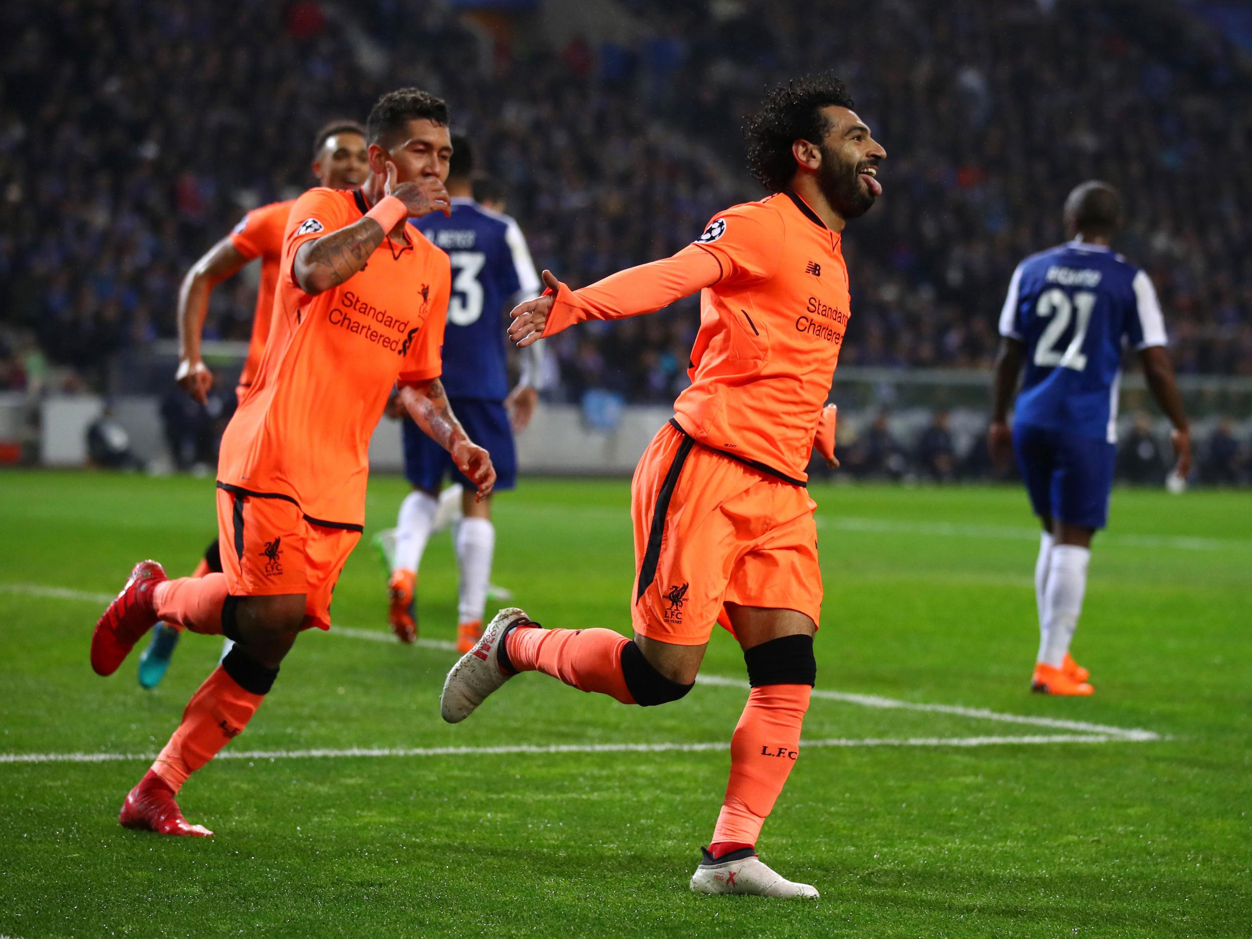 Mohamed Salah celebrates scoring his 30th goal for Liverpool