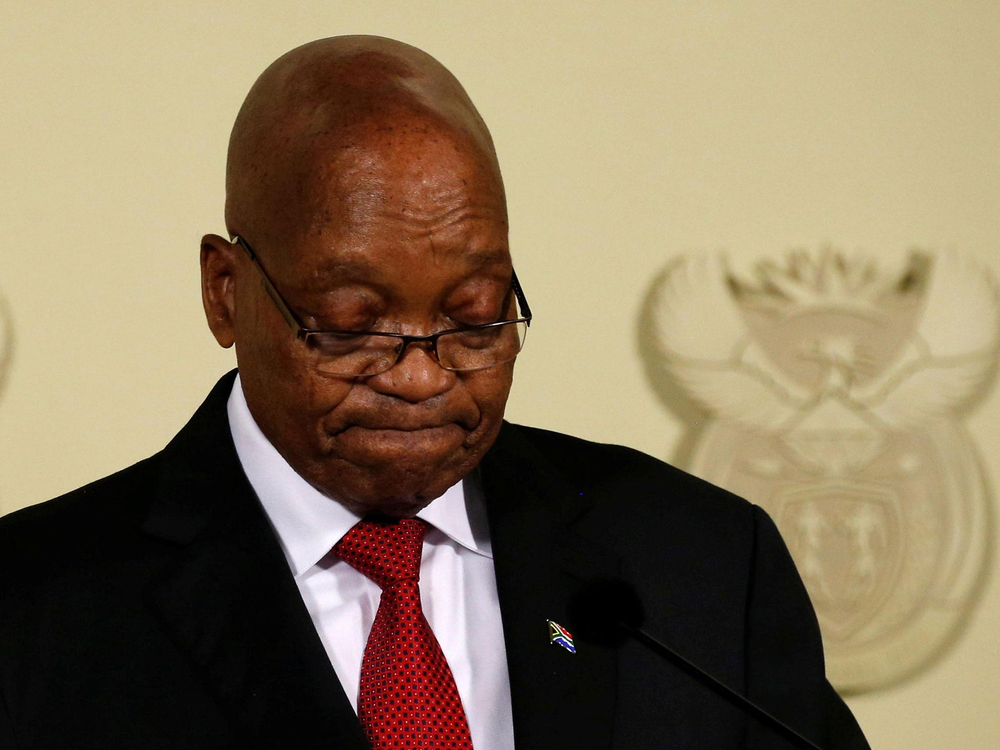 South Africa's President Jacob Zuma looks down as he speaks at the Union Buildings in Pretoria