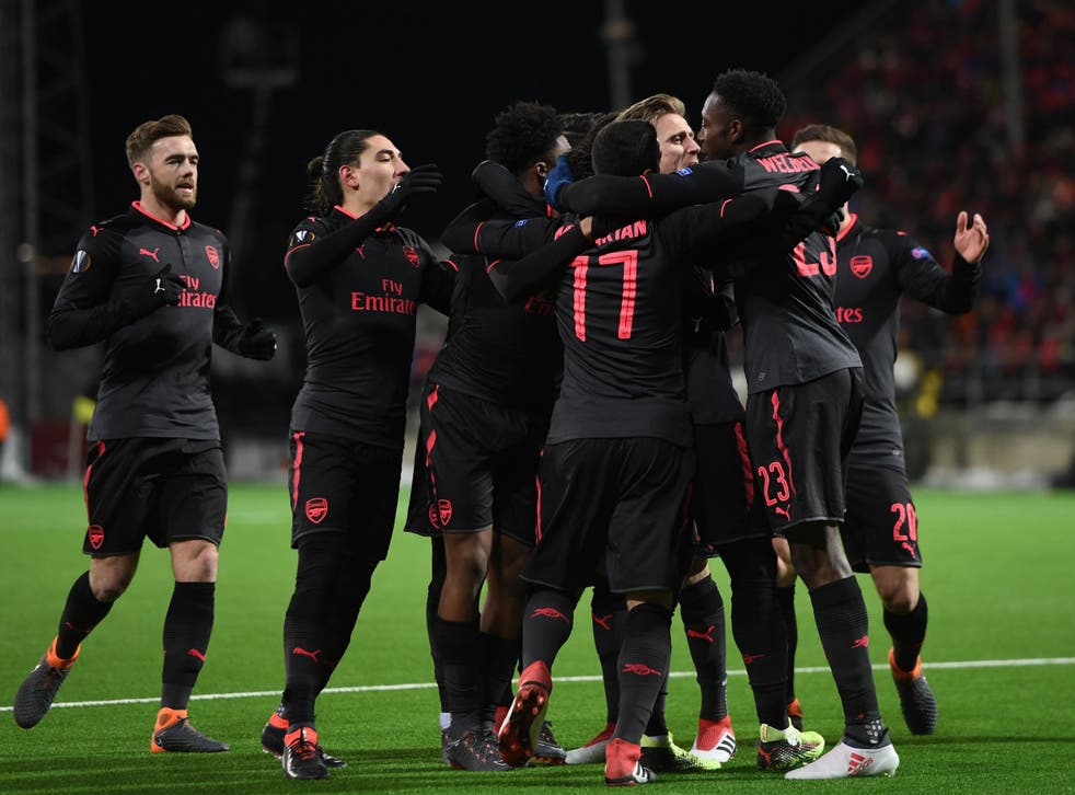Arsenal celebrate their third goal in Sweden