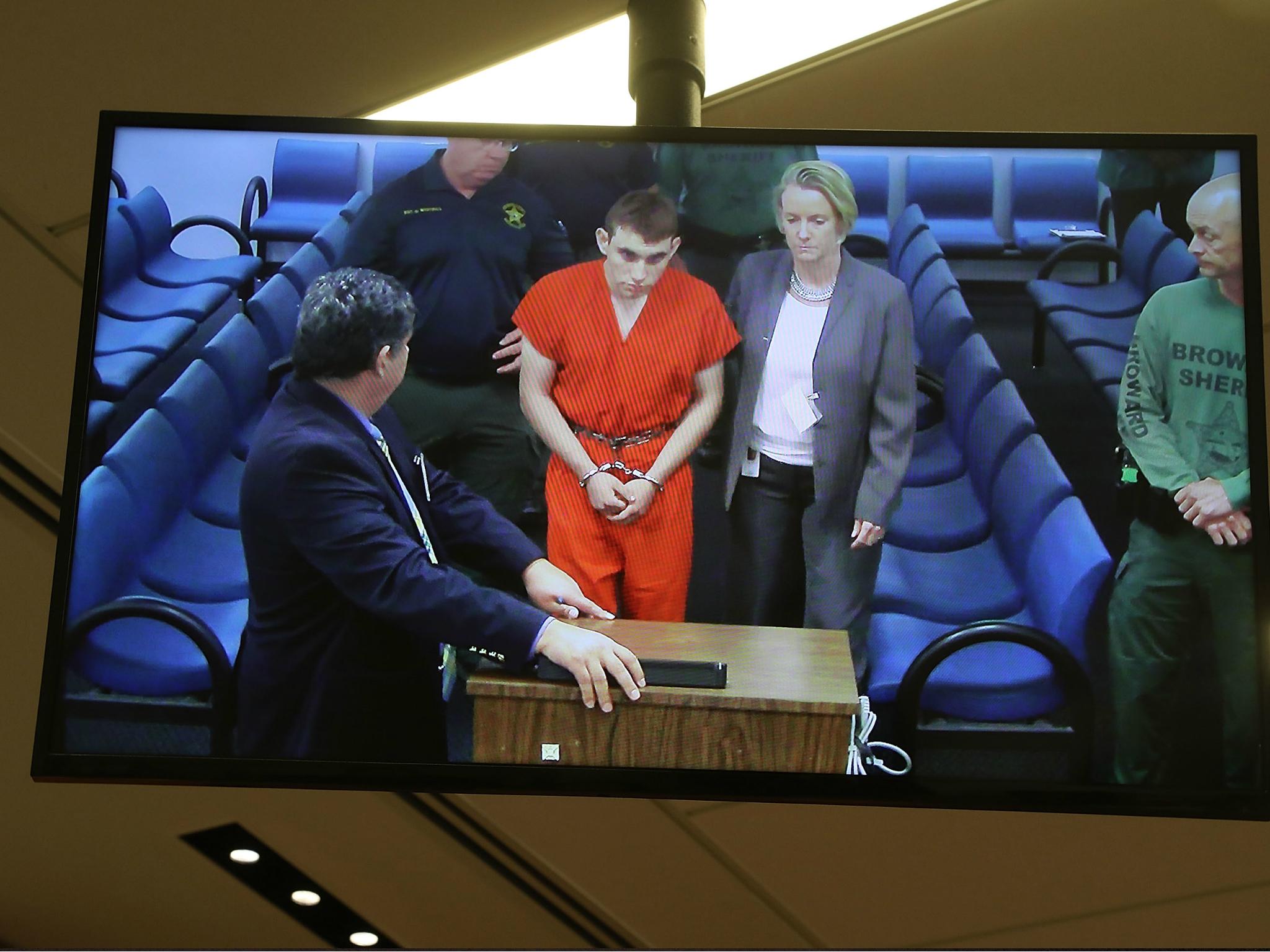 Nikolas Cruz, suspect in the Parkland, Florida school shooting, is seen on a closed circuit television screen during a bond hearing on 15 February 2018.