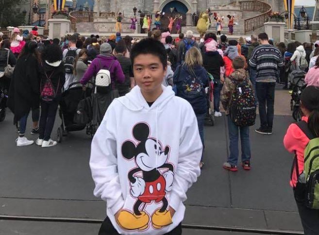 Peter Wang was killed after holding a door open for students