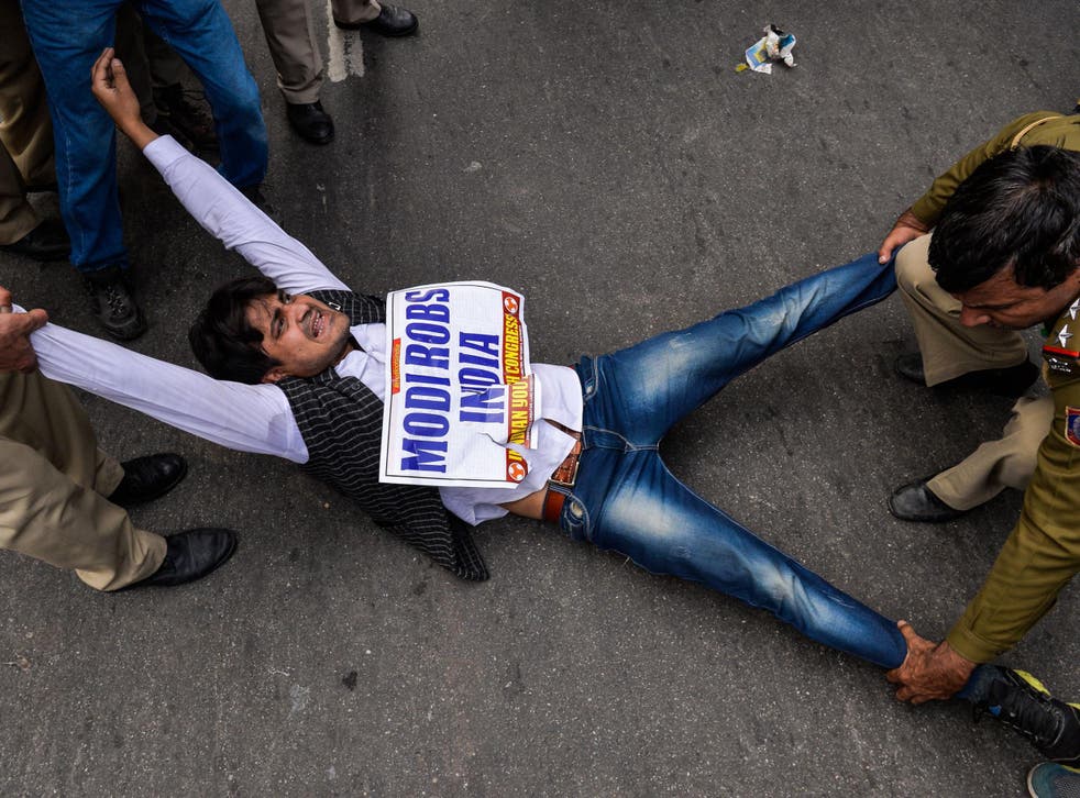A man protesting against Nirav Modi in New Delhi on Thursday