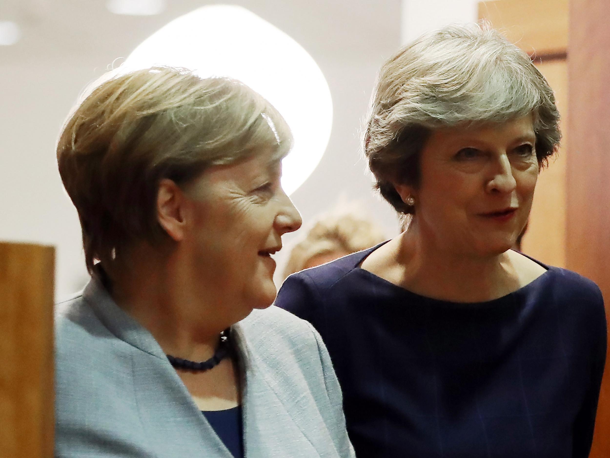 Theresa May (right) with German Chancellor Angela Merkel