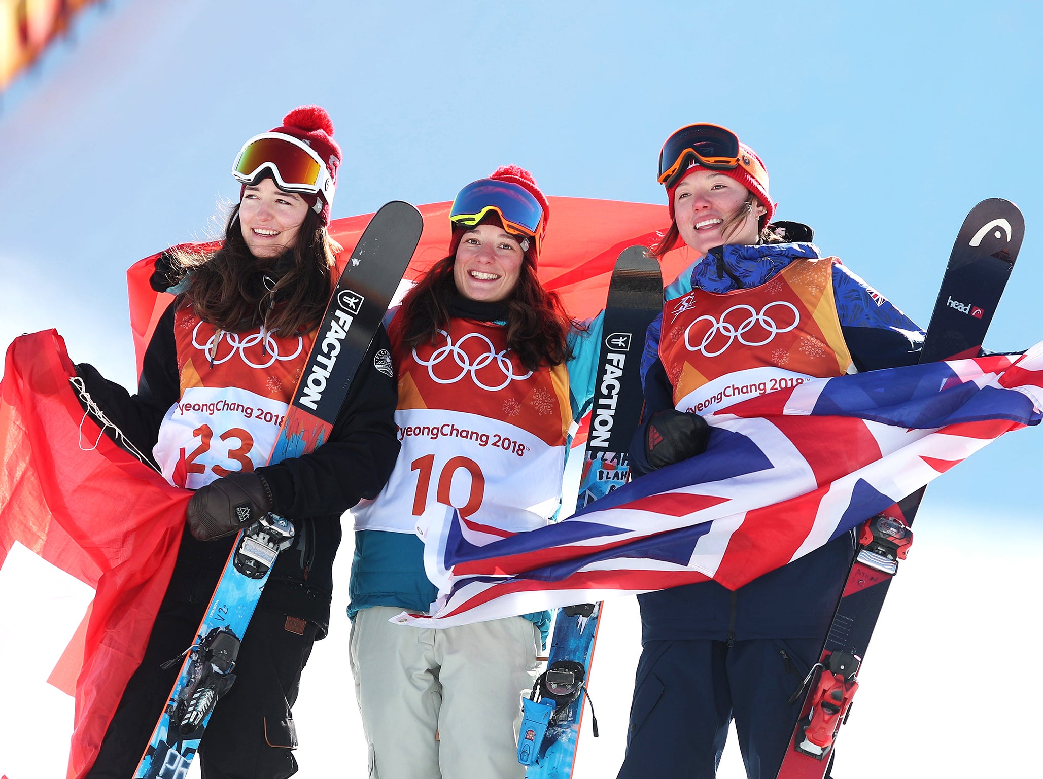 Atkin on the podium with Mathilde Gremaud and Sarah Hoefflin