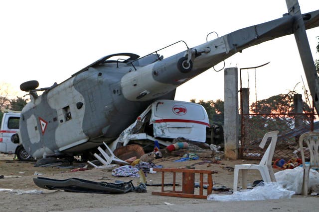 The remains of the military helicopter that fell on a van in Santiago Jamiltepec
