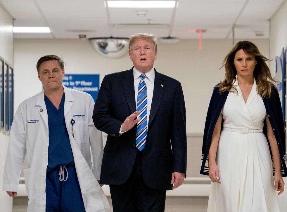The President and first lady Melania Trump visits Broward Health North hospital following the Parkland school shooting