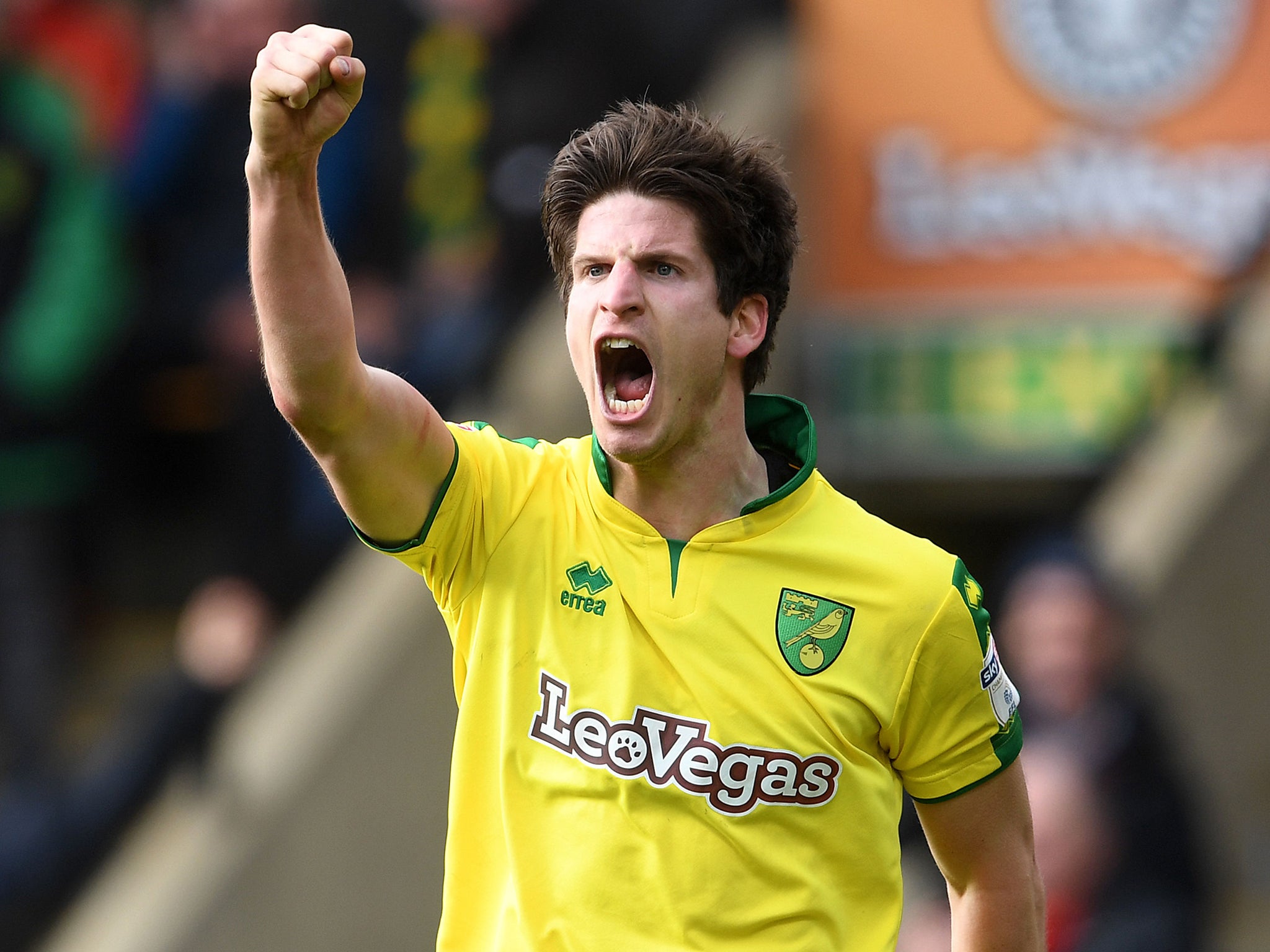Timm Klose celebrates after Norwich's late equaliser against rivals Ipswich Town