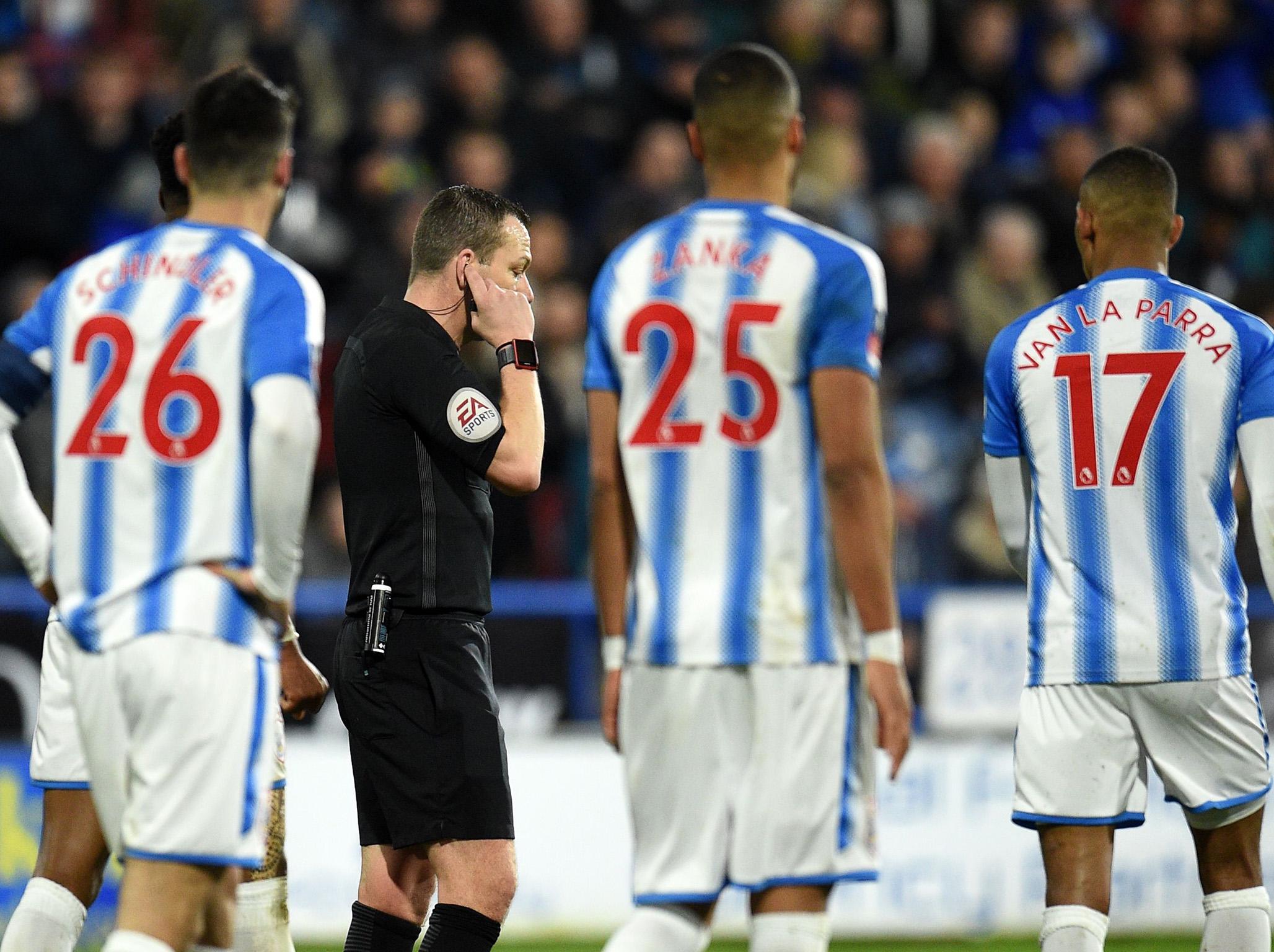 Kevin Friend turned to the VAR to help with an offside decision