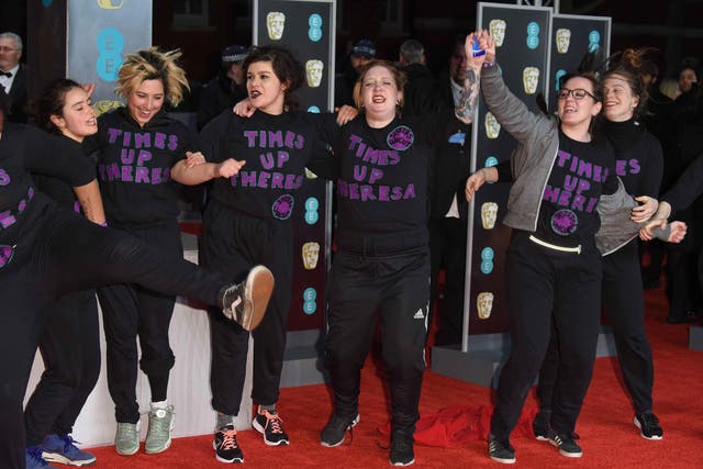Protesters wearing 'Time's Up Theresa' T-shirts at the BAFTAs 2018