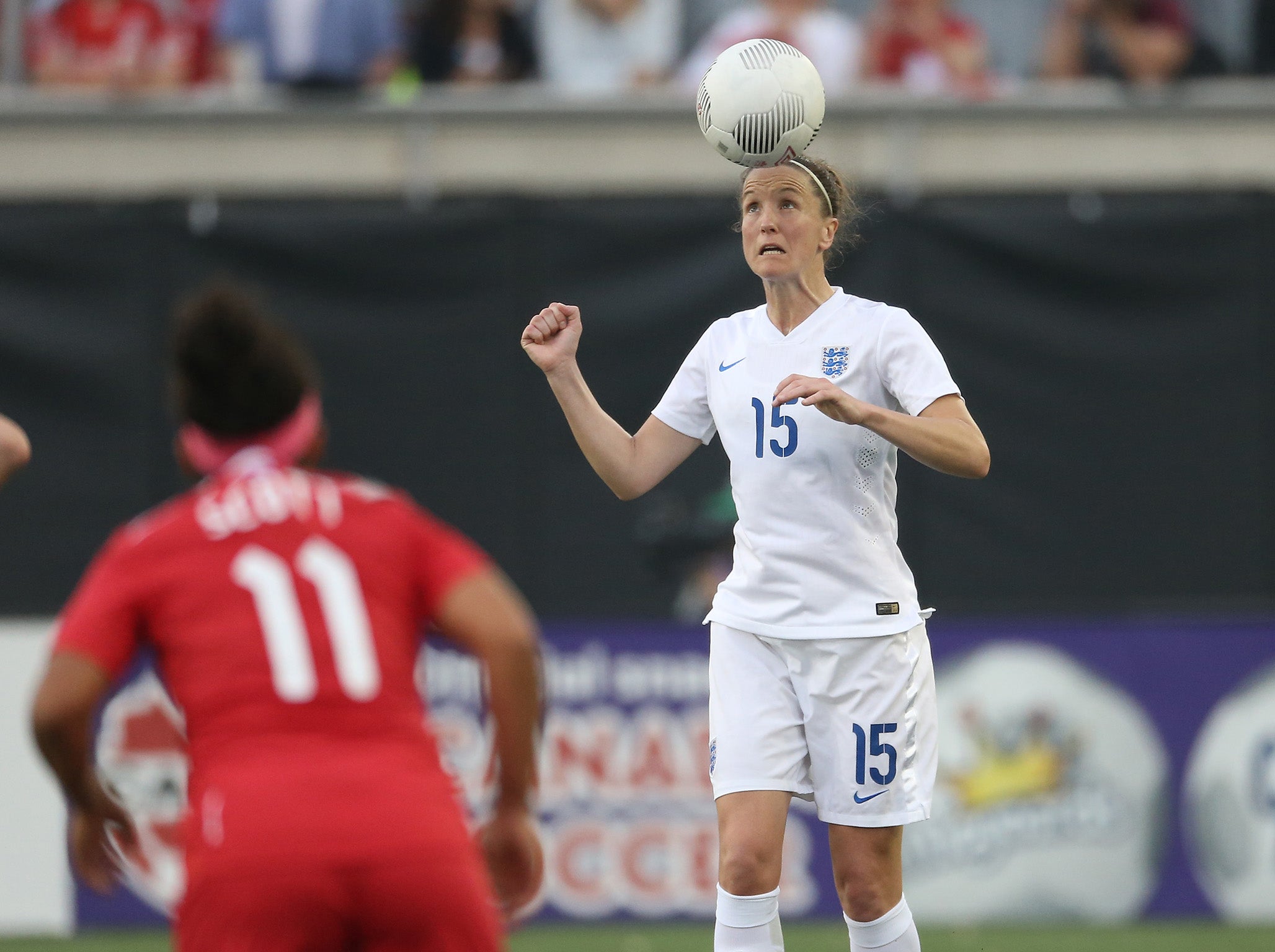 Casey Stoney playing for England in 2015