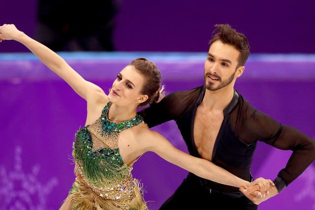 Gabriella Papadakis bravely completed her routine with Guillaume Cizeron after suffering a wardrobe malfunction