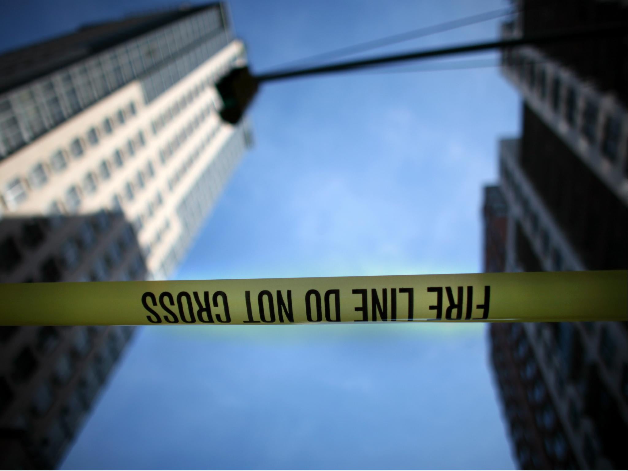 FDNY has cordoned off the sidewalk near a building where a piece of fire escape fell and killed a man