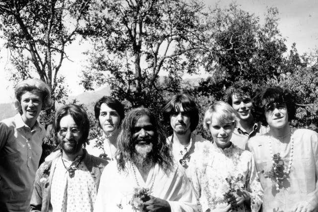 Maharishi Mahesh Yogi (centre) with Lennon, McCartney, Harrison, Mia Farrow, Donovan and others at the guru's academy in Rishikesh, India, in 1968