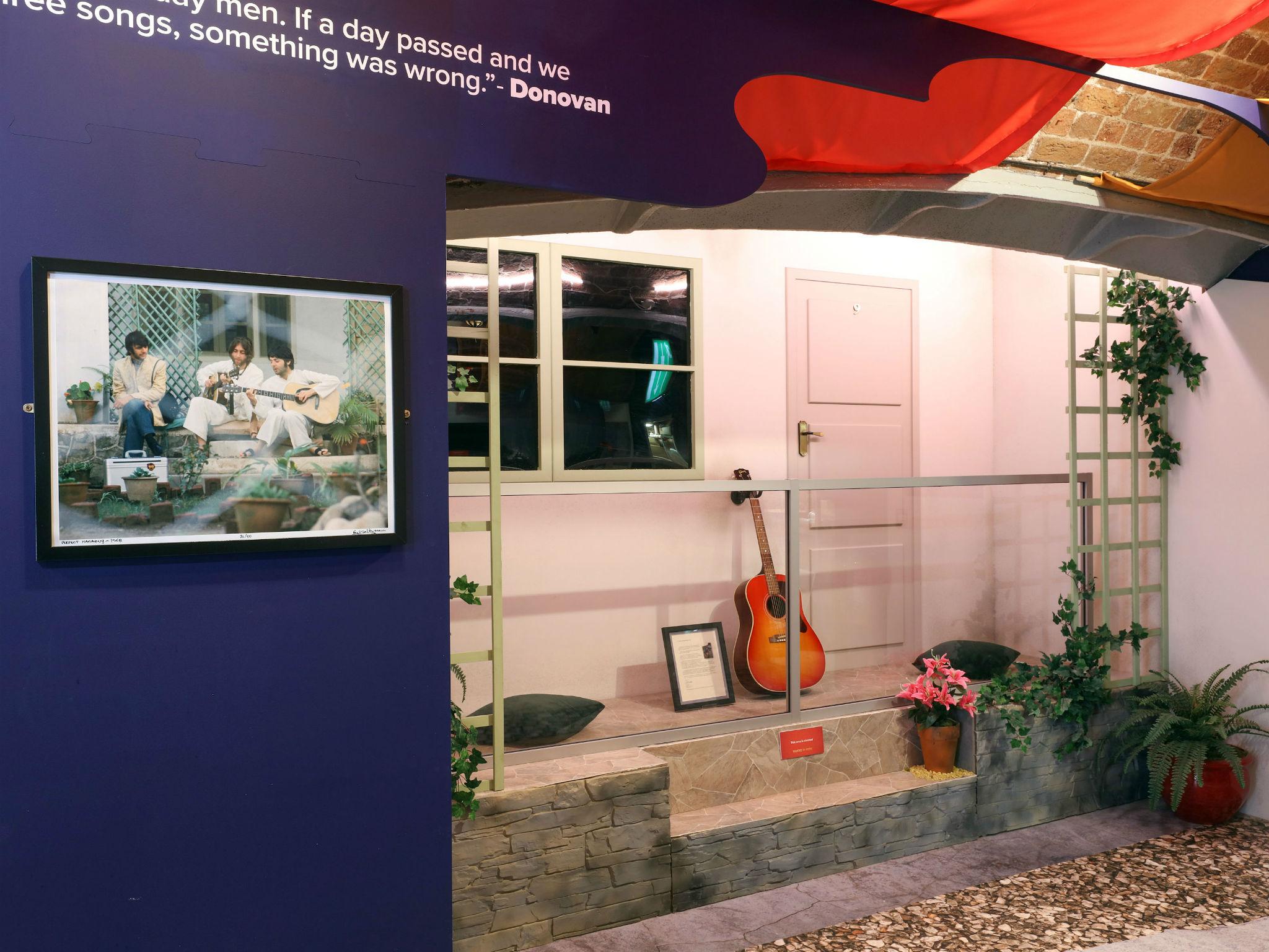 A reconstruction of John Lennon’s No 9 bungalow with Donovan’s guitar outside at the Beatles in India exhibition