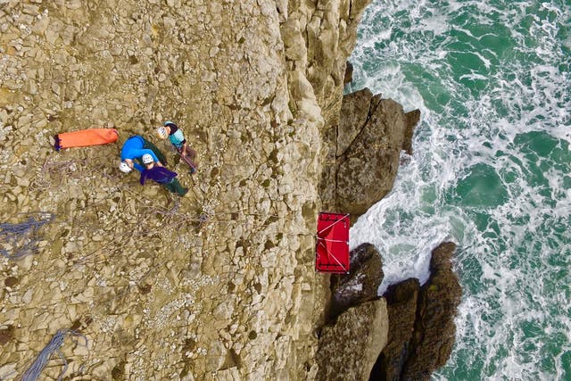 Cliff camping means sleeping over the edge of a drop