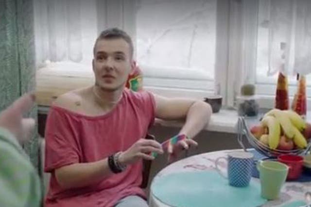 The video feature an actor playing a gay man filing his nails