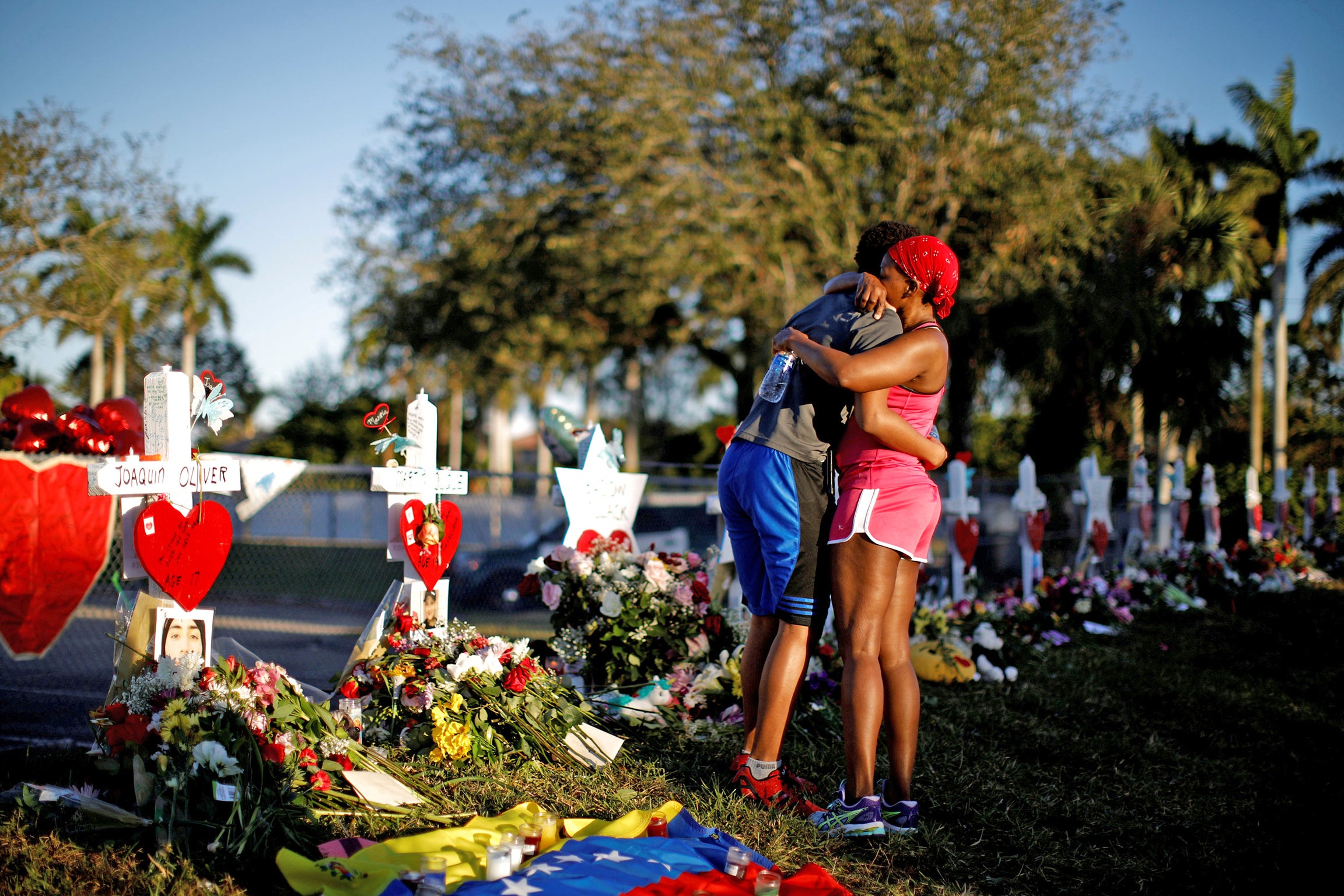 Mourners at a vigil in Parkland, Florida following the February shooting