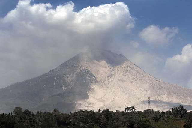 Mount Sinabung shot plumes of ash 23,000ft high but no one was hurt