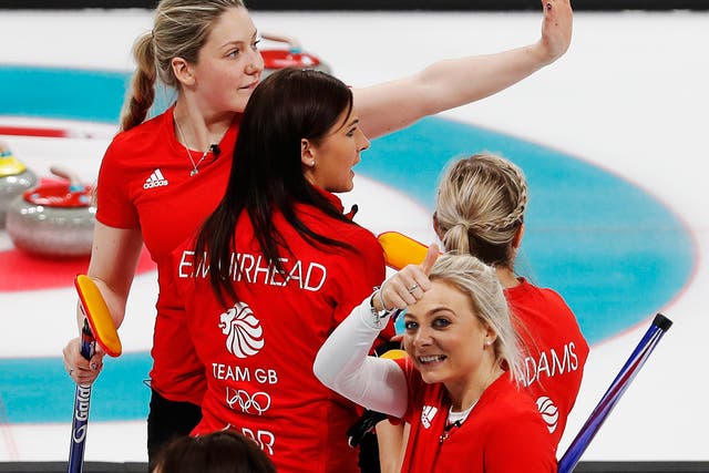 Anna Sloan gives the British fans thumbs up after Great Britain's 8-6 win over Japan