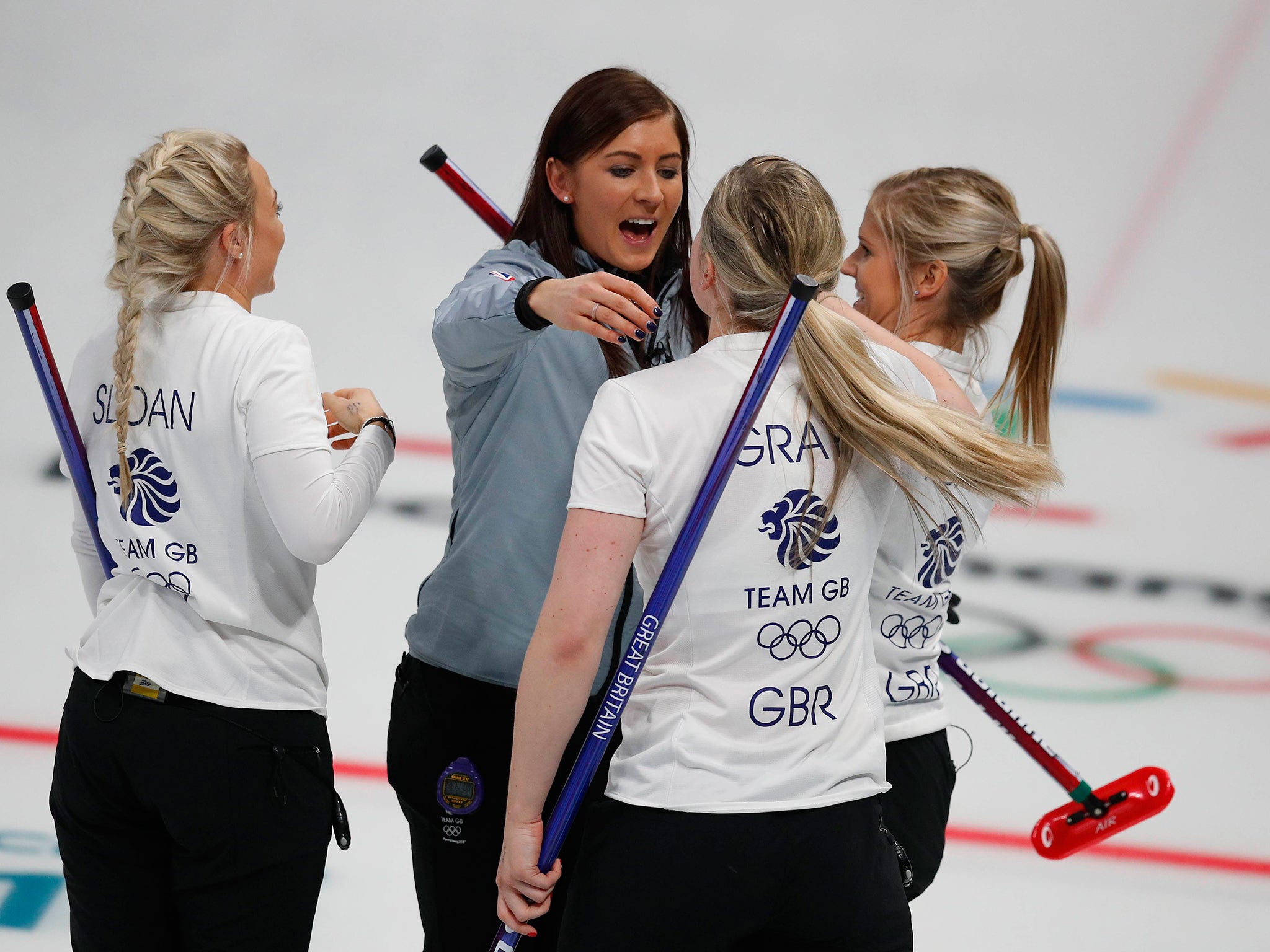 The British women's curling team celebrate their victory over Canada (Getty)