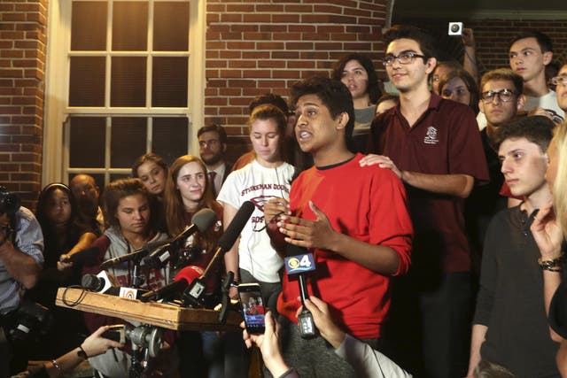 Tanzil Philip, 16, a student survivor from Marjory Stoneman Douglas High School, where 17 students and faculty were killed in a mass shooting on Wednesday, speaks to a crowd of supporters and media as they arrive at Leon High School, in Tallahassee