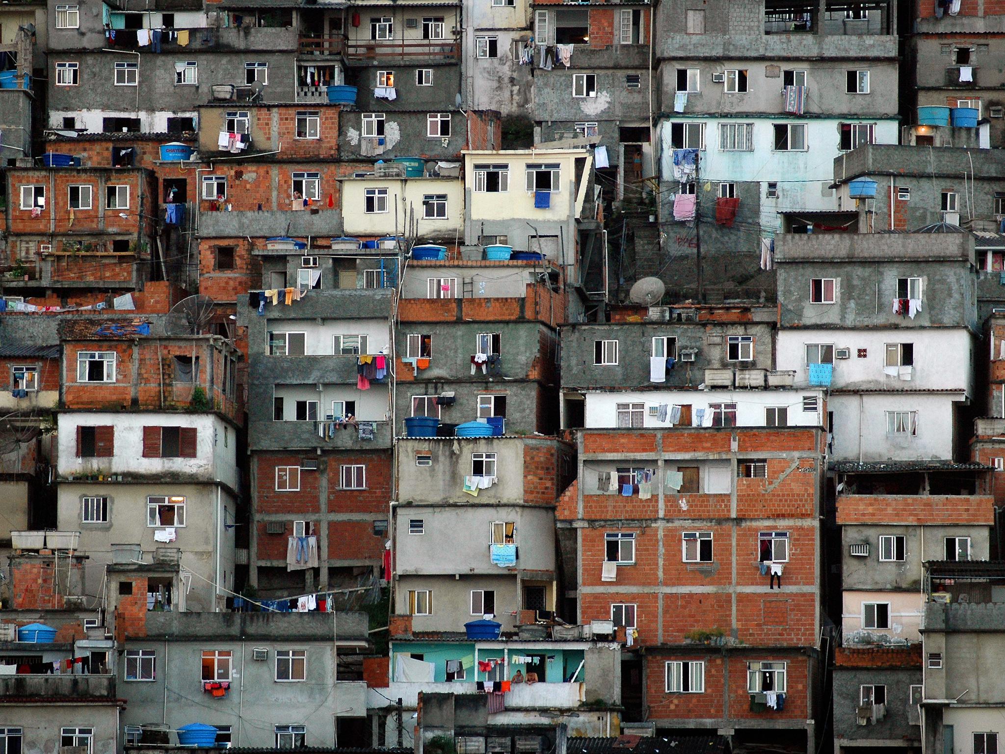 Favela Morro dos Cabritos: these crowded houses climb mountain act as backdrop inlands from Copacabana
