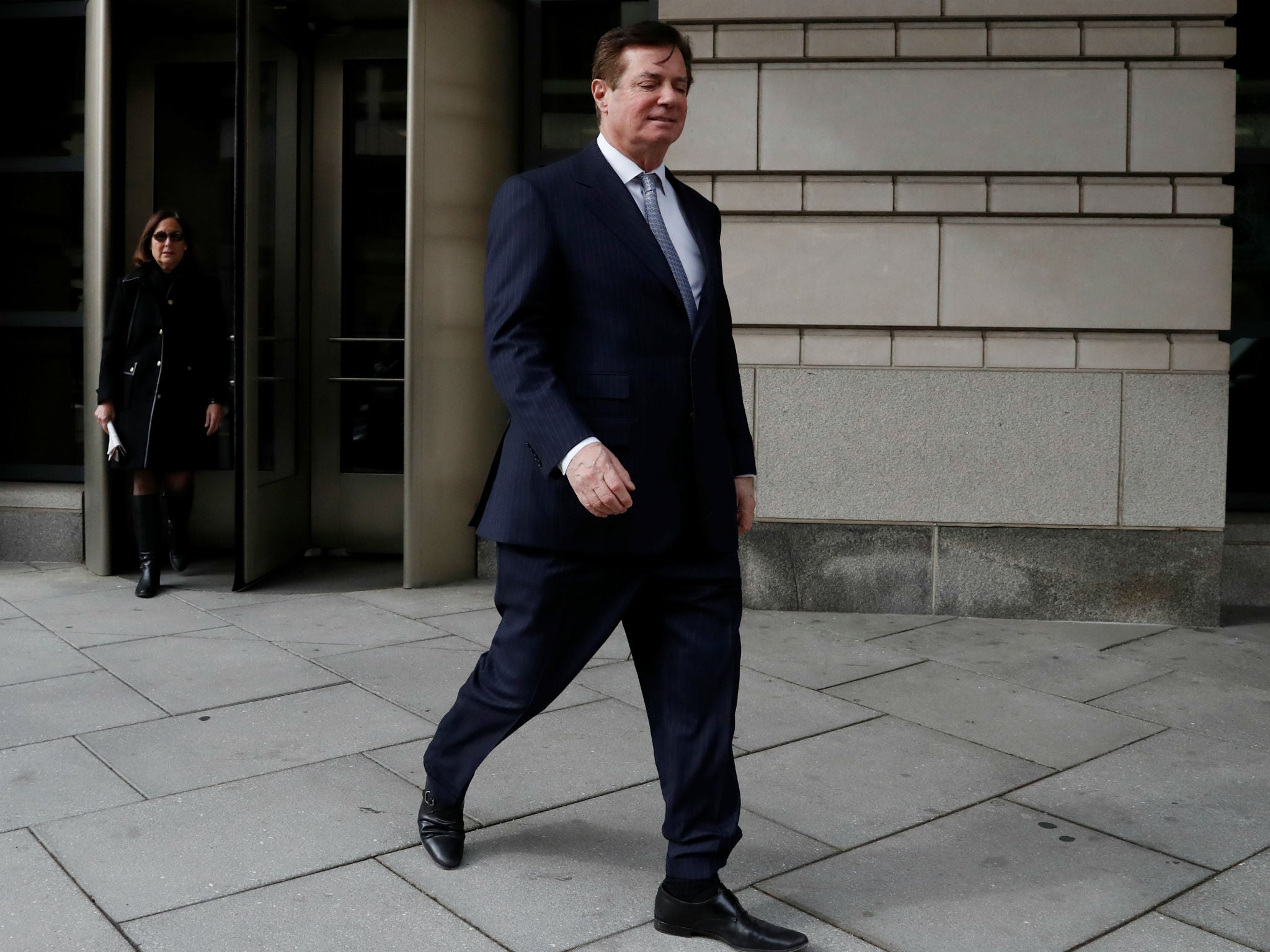 Paul Manafort leaves US District Court in Washington, DC February 14, 2018