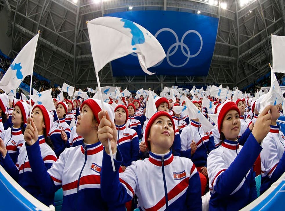 North Korean cheerleaders support the South Korean men’s ice hockey team in PyeongChang