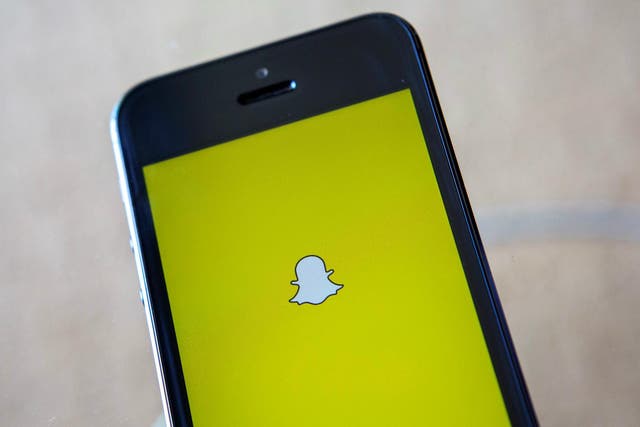 A portrait of the Snapchat logo in Ventura, California December 21, 2013