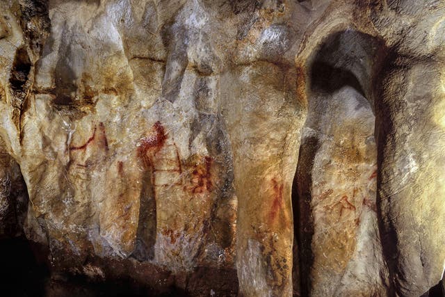 Paintings on the wall of La Pasiega cave, made over 64,000 years by Neanderthals.