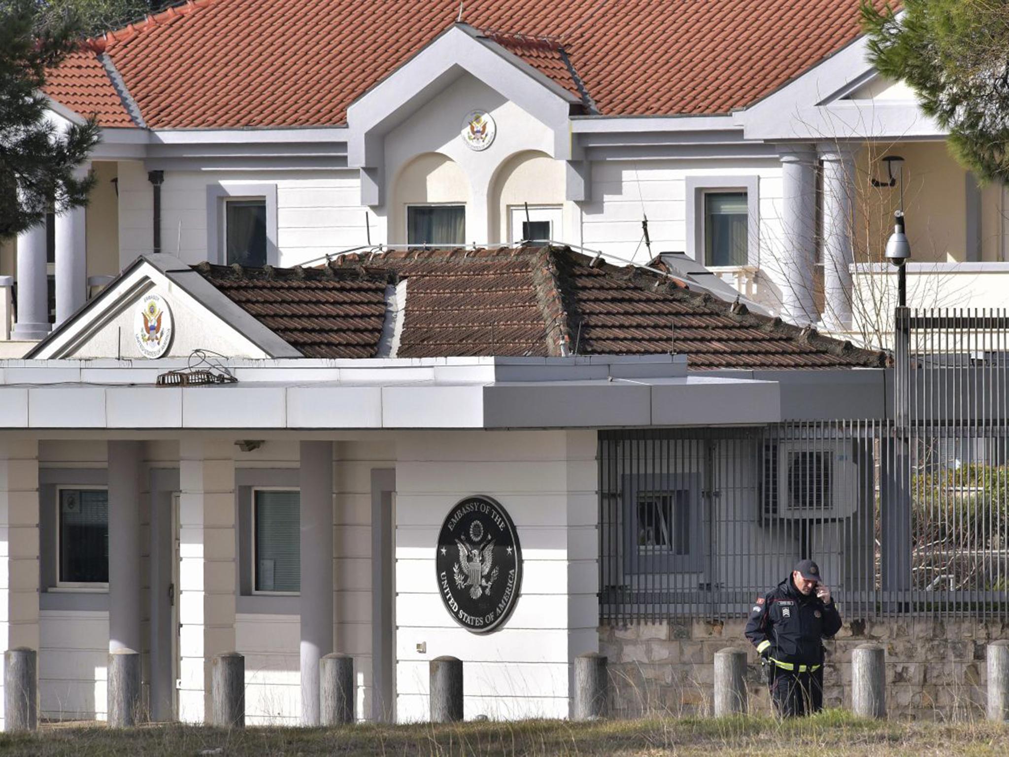 A police officer stands guard outside the U.S. embassy in Montenegro's capital Podgorica